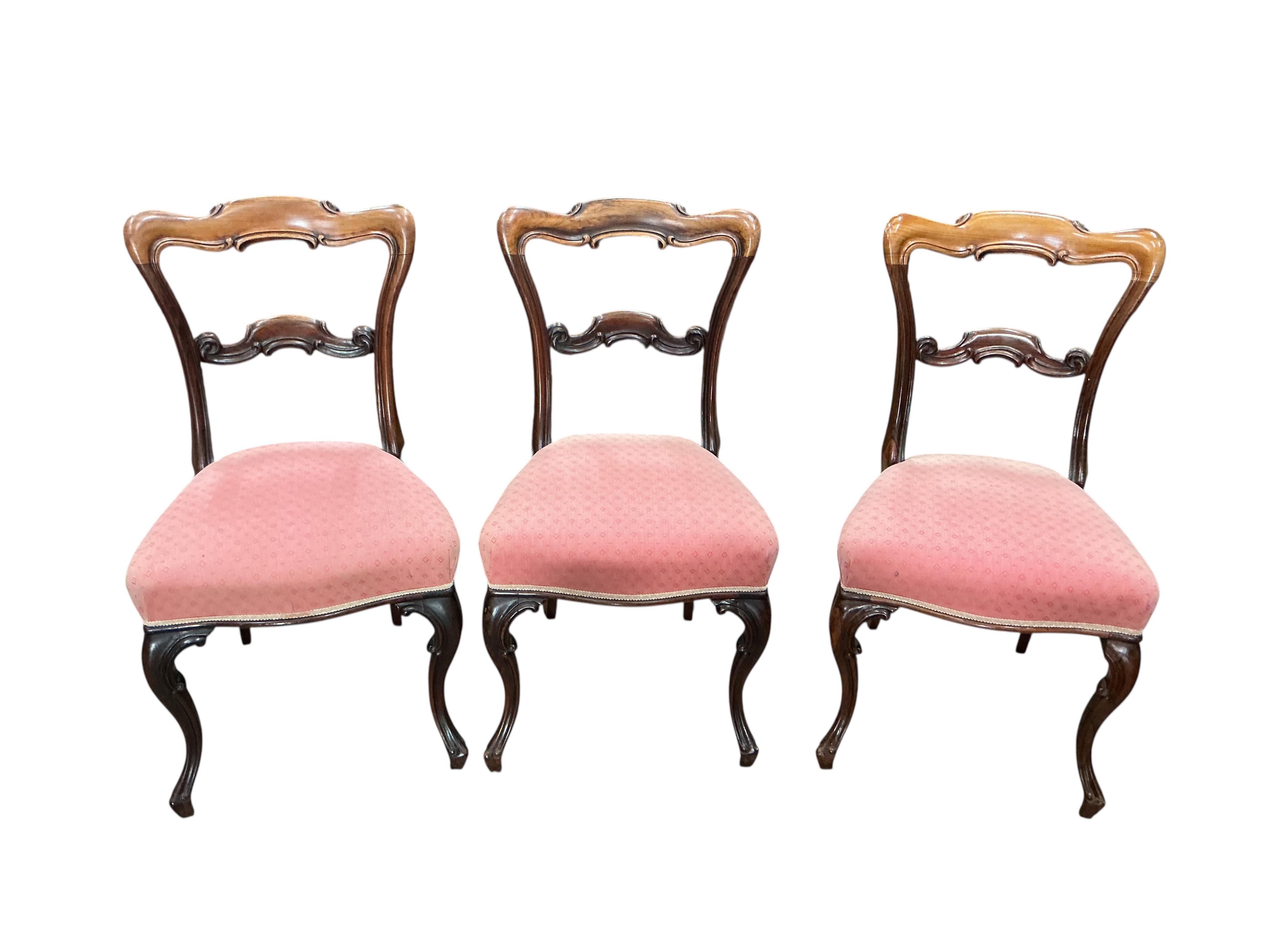 A set of six early Victorian rosewood dining chairs